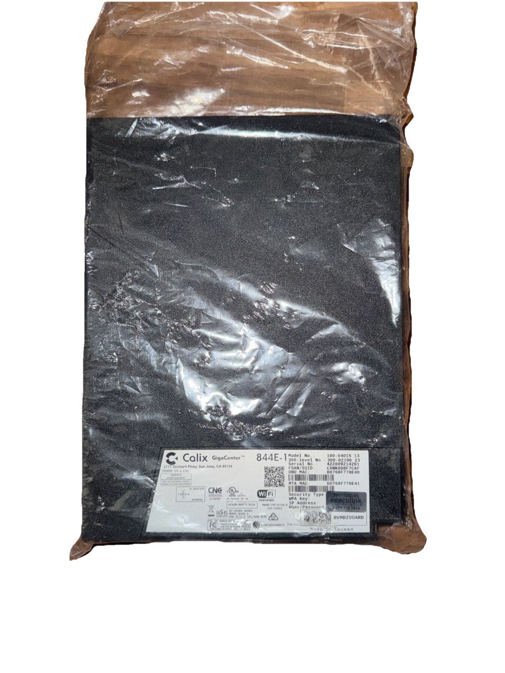 Calix Gigacenter 844E-1 Router No Cables – a bag of black plastic bags
