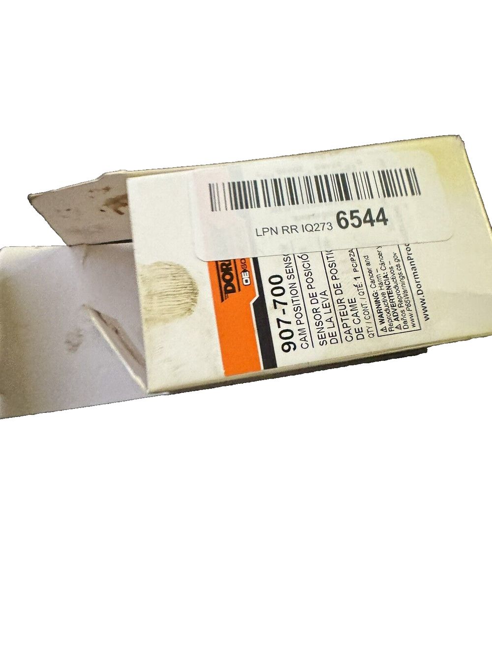 Dorman 907-700 Engine Camshaft Position Sensor Compatible with Select BMW Models – a box of white paper with a barcode on it