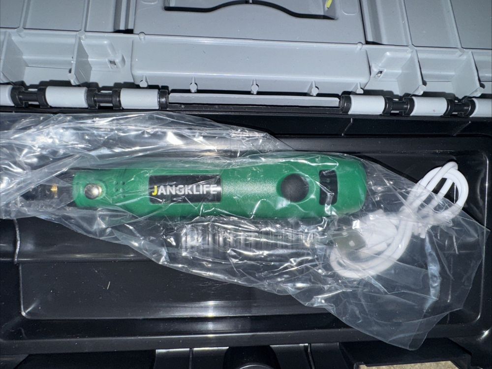 Jangklife Mini Battery Operated Rotary Tool Kit – Compact & Versatile for DIY – a green and black tool in a plastic case