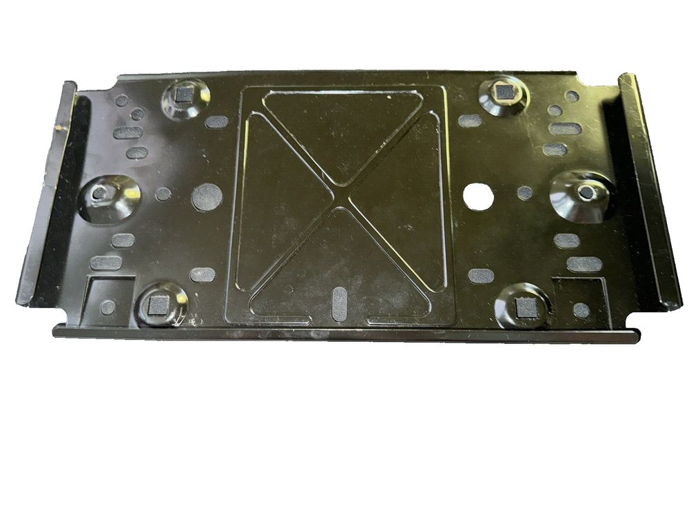 Dorman 68148 Front License Plate Bracket – a black metal plate with screws and nuts