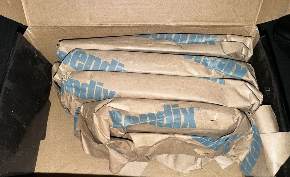 Bendix Premium SBC1210 Ceramic Front Brake Pads for Select Models Lexus HS250h, – a box with a bunch of blue and white paper