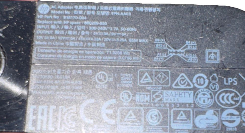 Genuine HP 65W USB C Power Adapter for X360 TPN-AA03 – a close up of a power supply