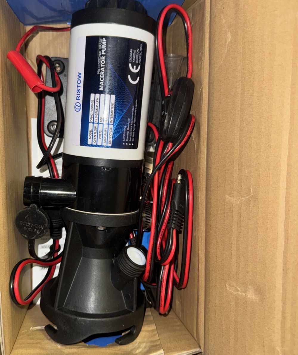 RISTOW RV Macerator Pump 12V, 12GPM RV Waste Water Pump Self-Priming – a box with a black and red cord