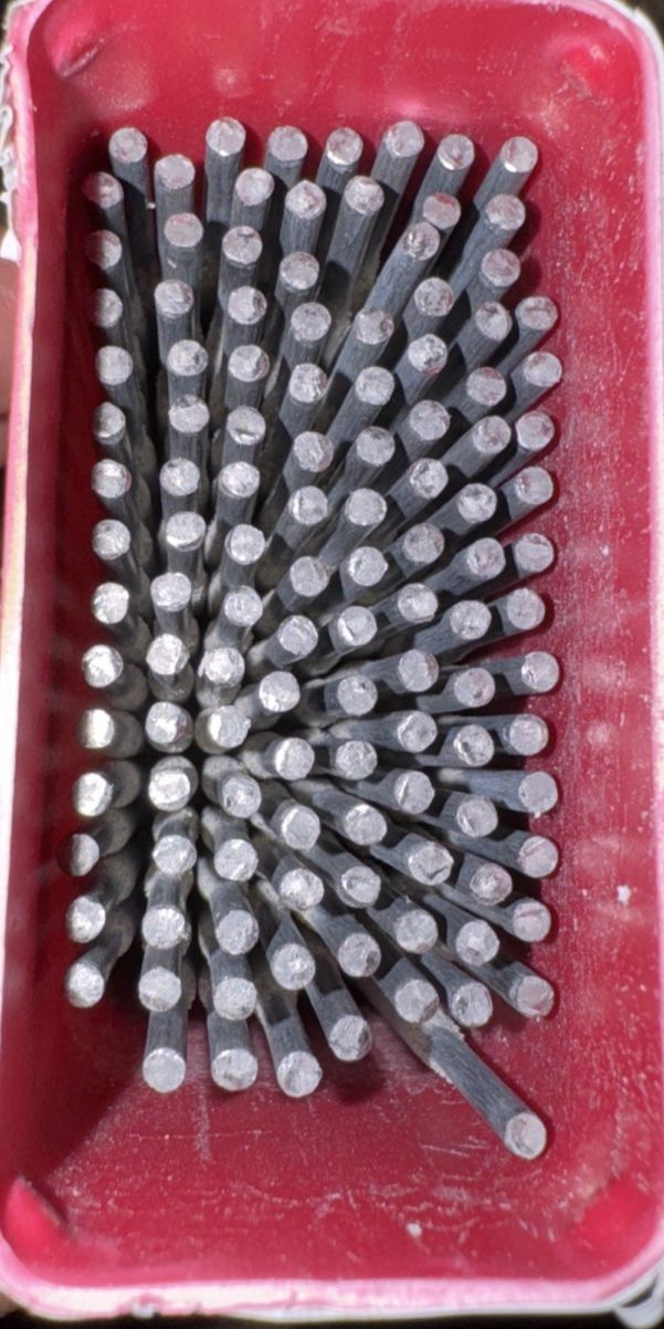 Mild Steel Electrodes E6011 2.5MM 2kg Powerweld, Power Weld – a red box filled with lots of screws