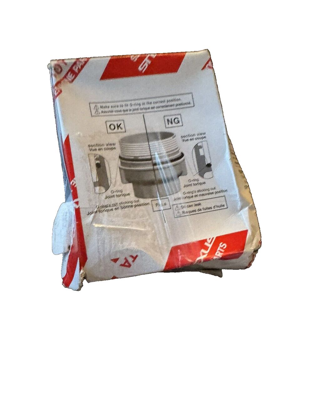 Toyota Genuine Parts 04152-YZZA1 Oil Filter – a white bag with a red and white label on it