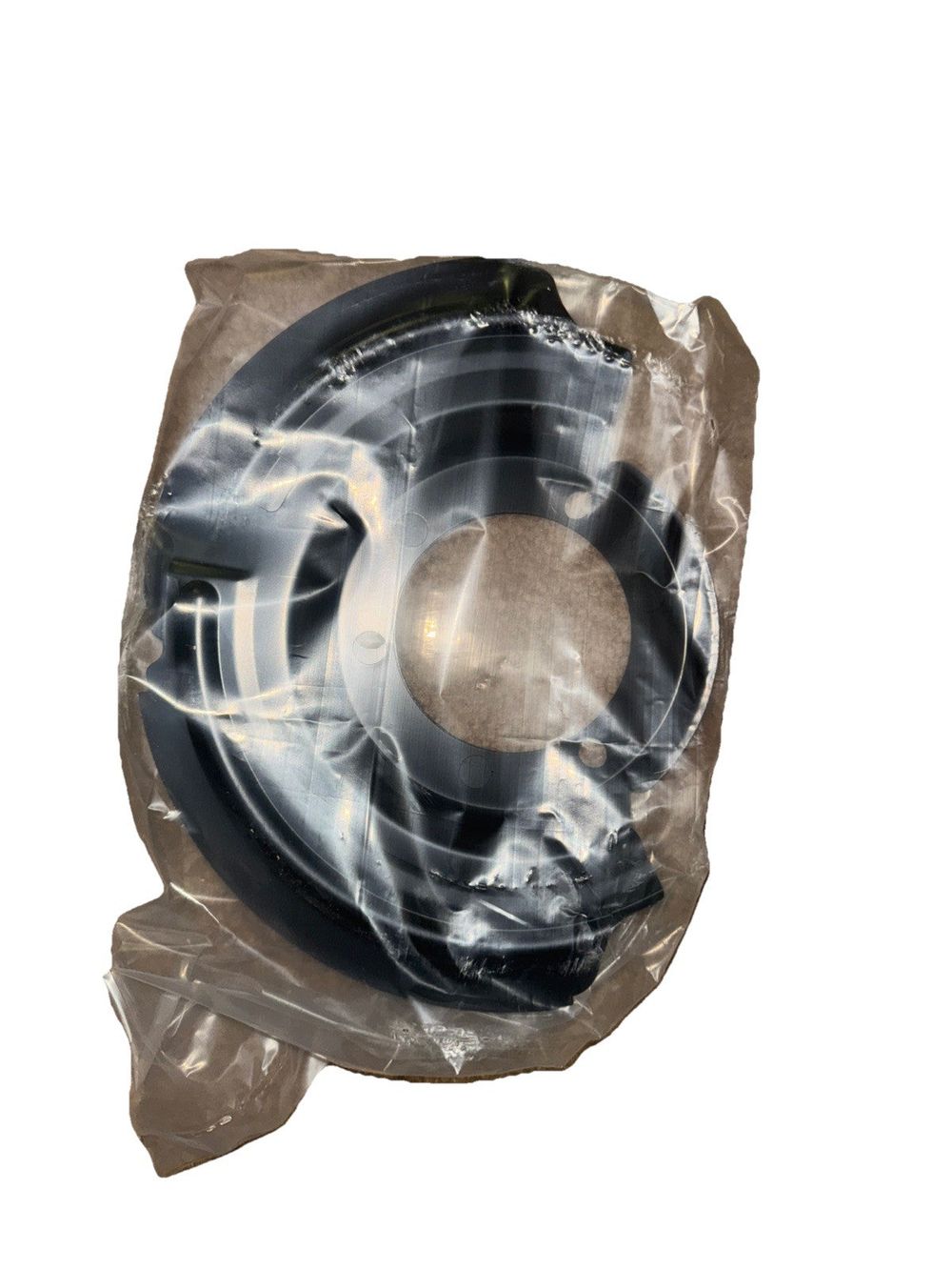 Brake Backing Plate SKP SKY01034 – a black and white object in a plastic bag