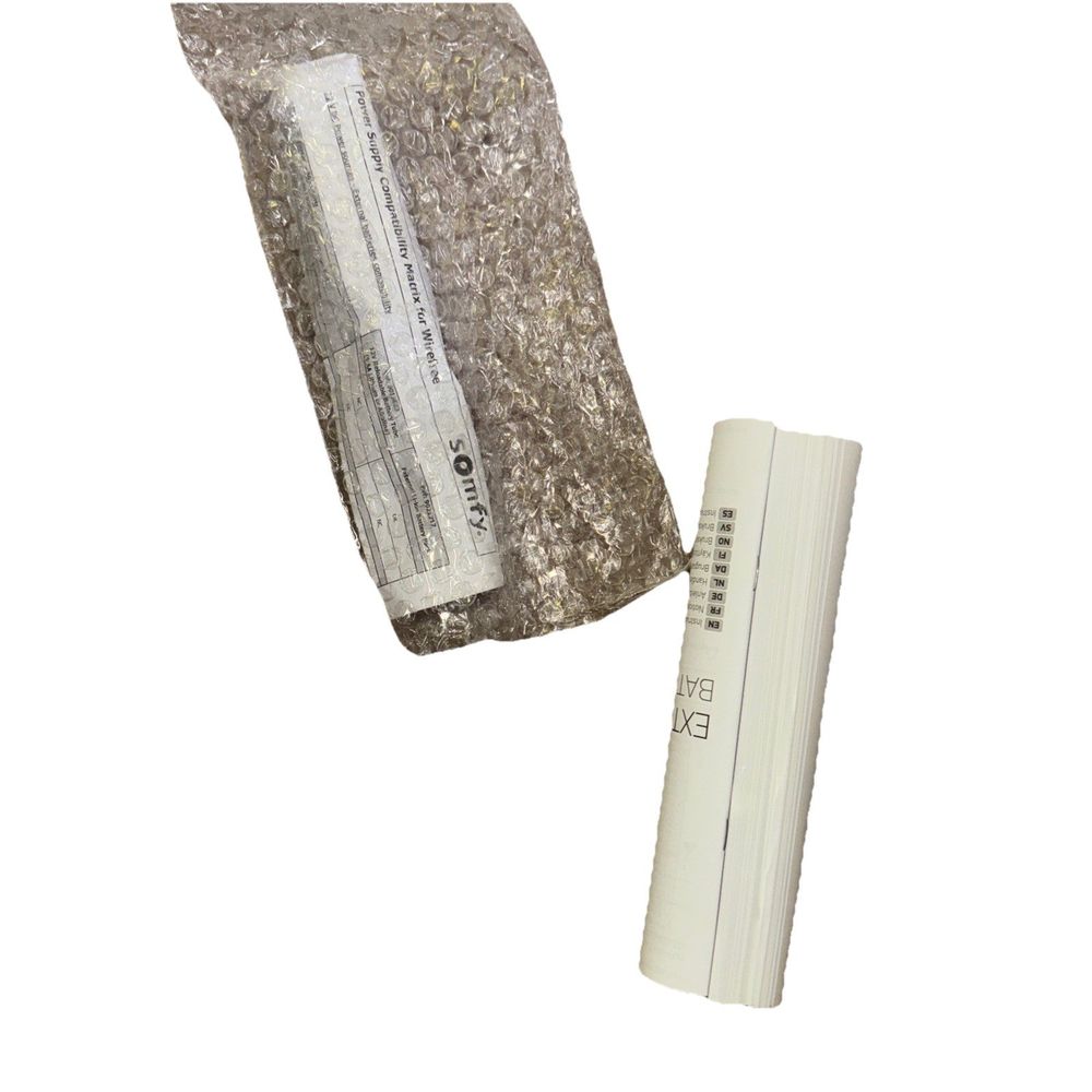 Somfy Rechargeable Lithium-ion Battery Pack for External Battery Wire Free Motor – a white tube and a white tube with a white tube