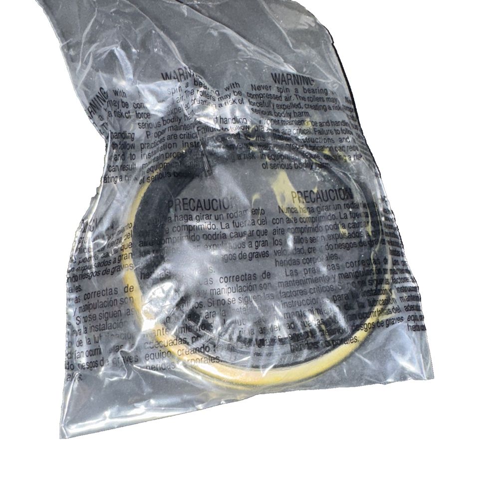 Timken Wheel Seal-RWD Timken 710573 – a bag of gold and silver foil