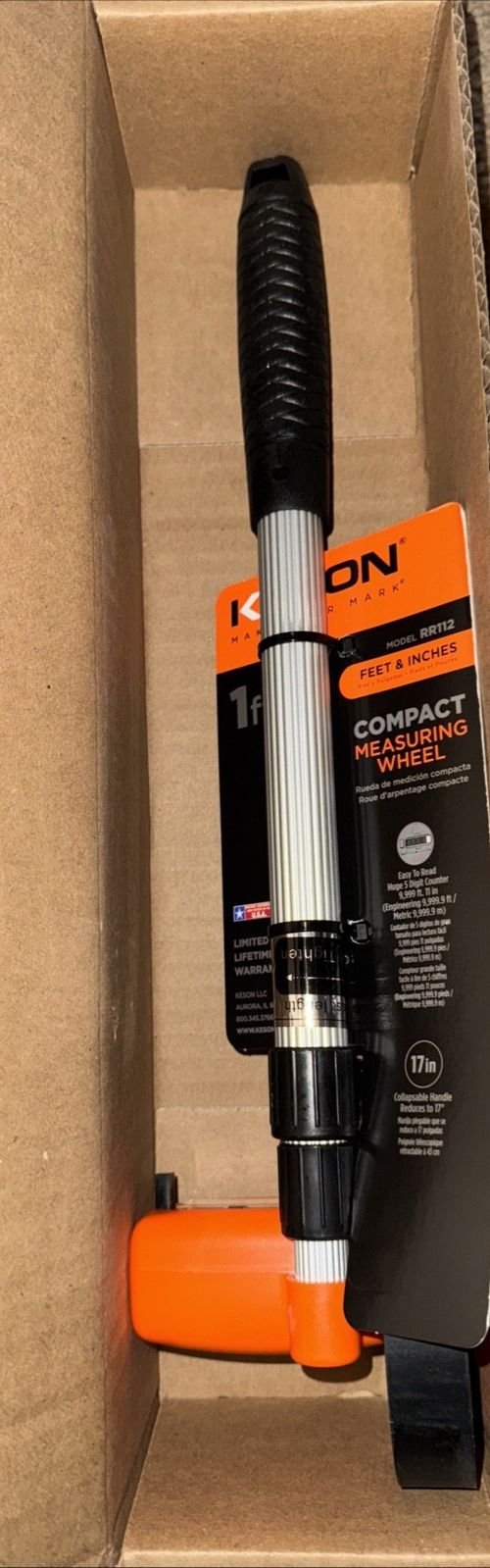 10000-ft Measuring Wheel With Telescoping Handle And Magnified Counter, Keson – a box with a drill and a drill