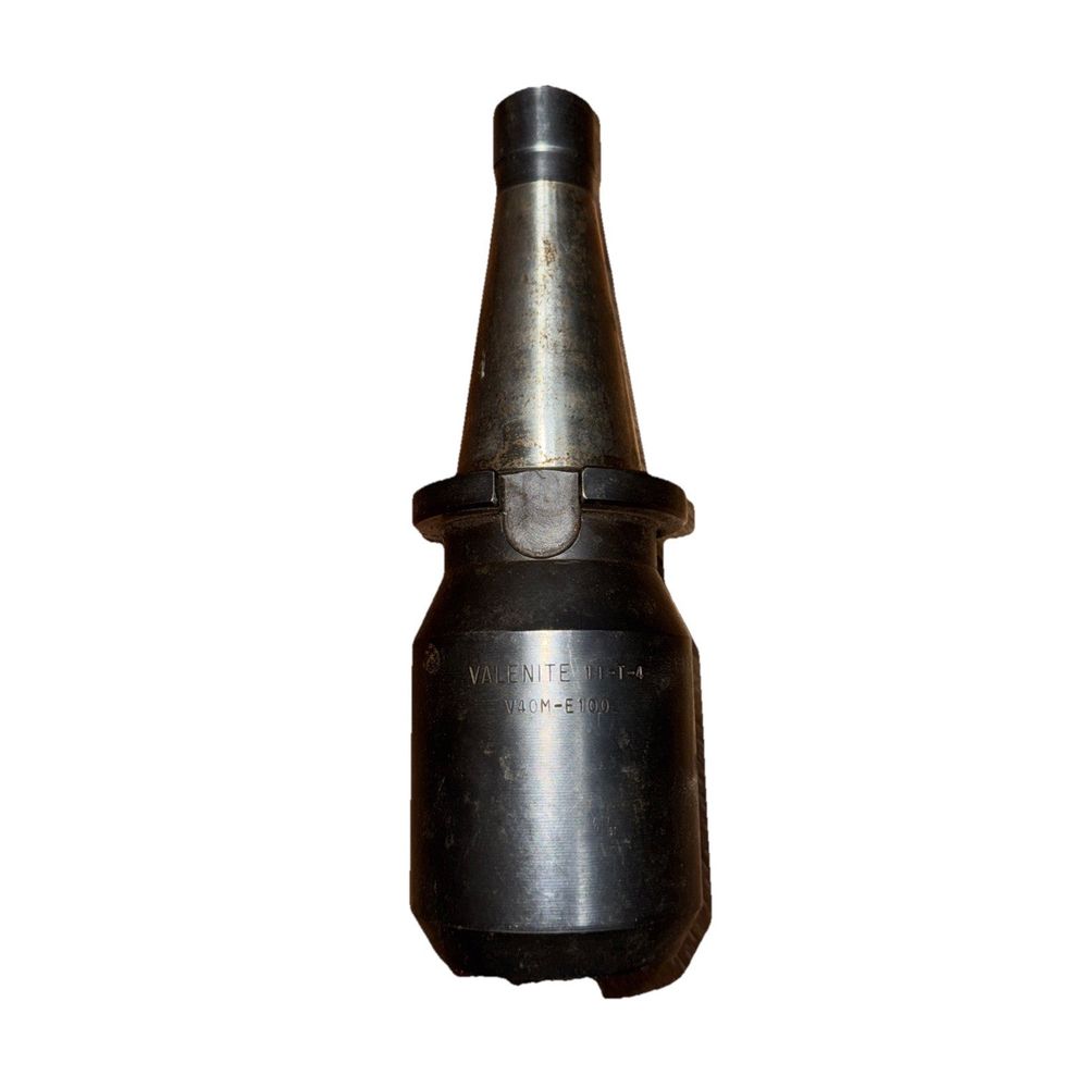 Valenite Tool Holder V40M-E100 11-T-4 – a metal object with a white background