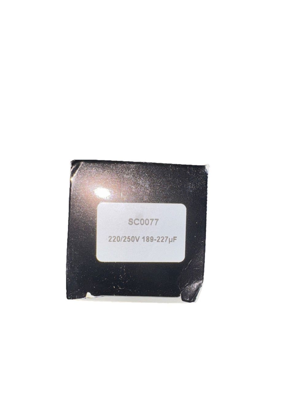 TEMCo Industrial 189-227 uf/MFD 220-250 SC0077 – a black and white photo of a small chip