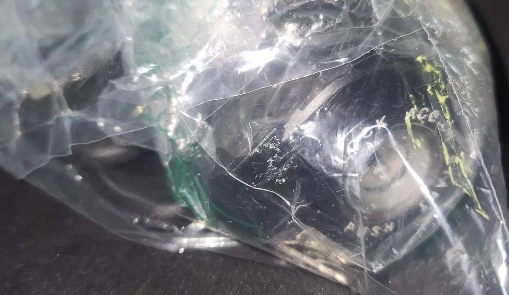 Black ACROPIX Car Ignition Lock Cylinder 2 Keys - Hyundai Sonata GLS – a bag of plastic material on a table