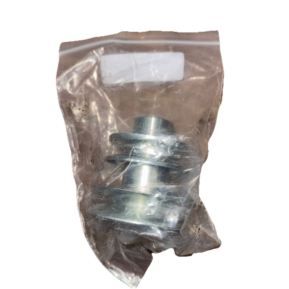 Engine Double Pulley - 3.25" / 2.75" Dia. 756-0241B, DaveyDooDeals – a piece of plastic wrap with a metal bolt