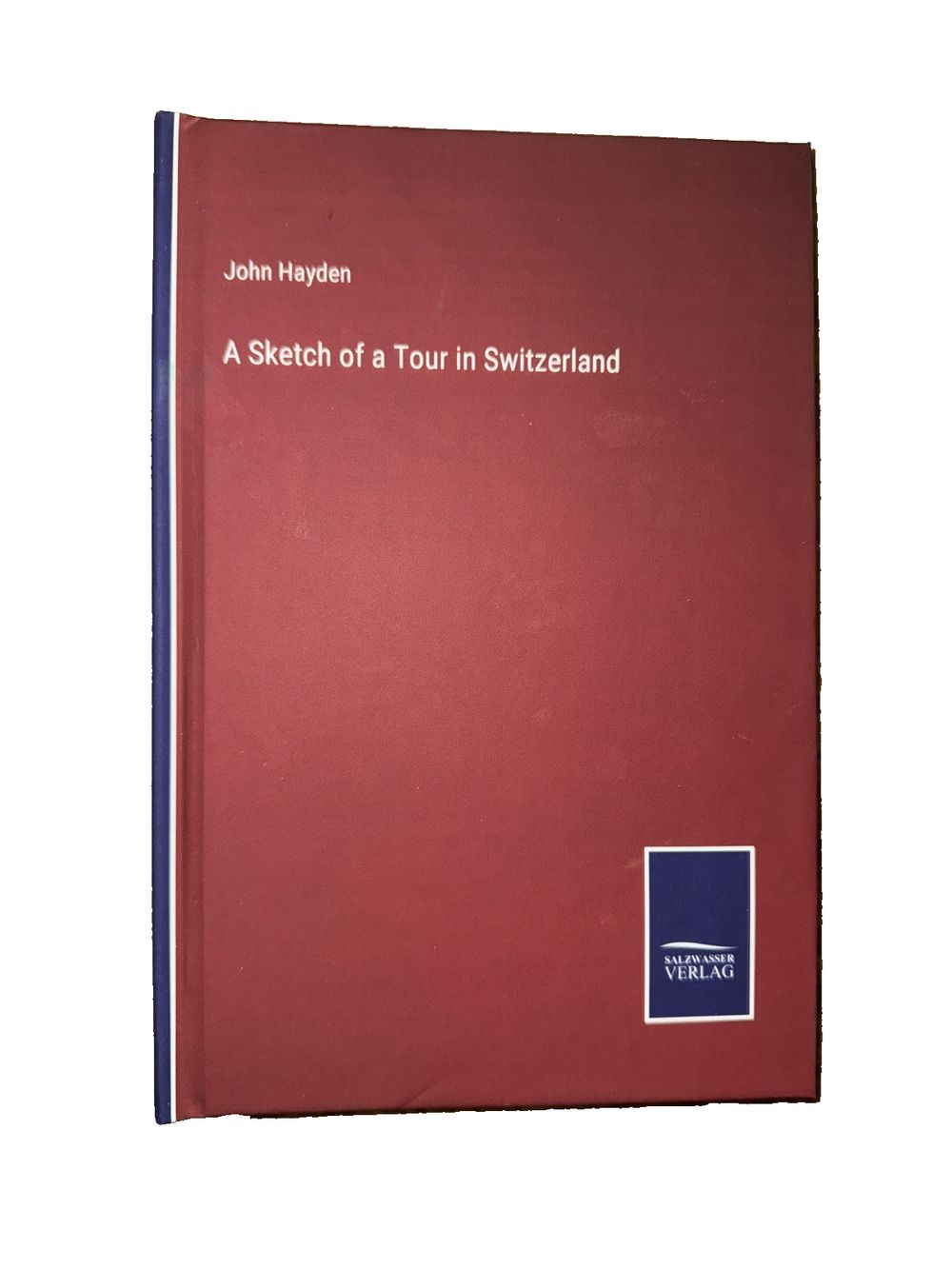 A Sketch of a Tour in Switzerland, DaveyDooDeals – a red book with a blue cover and a white title