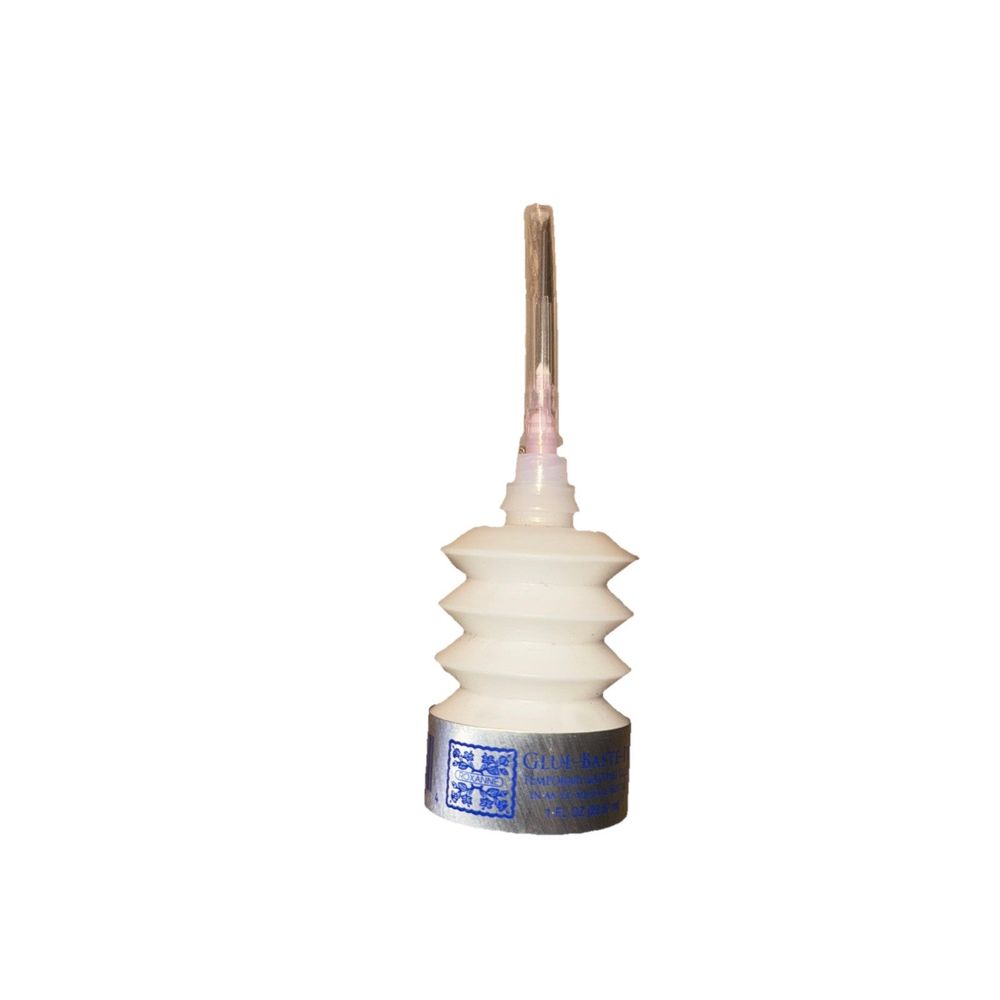 Roxanne Glue Baste It 1oz EZ-Squeezie Bottle – a white plastic bottle with a wooden handle