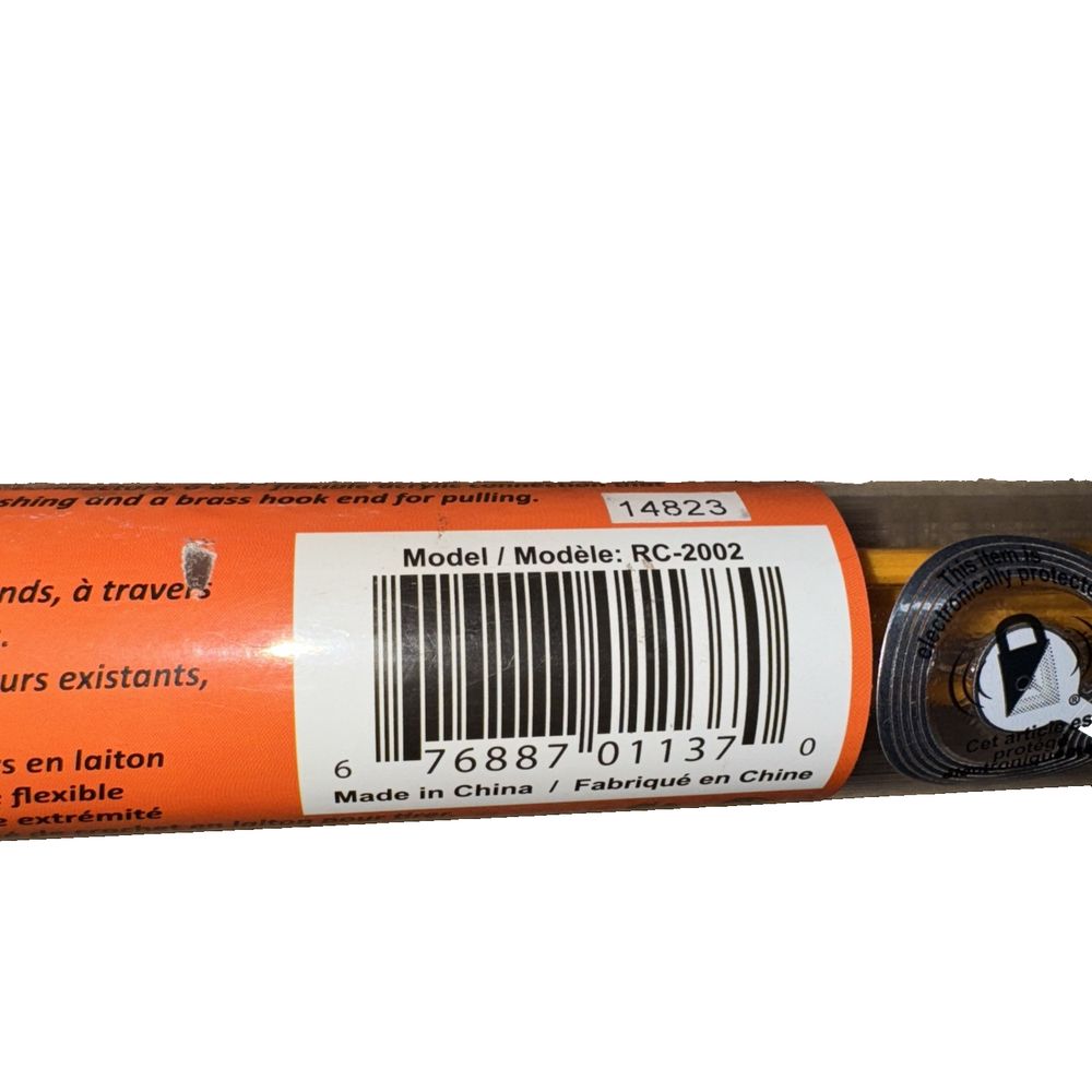 KMC 11ft Fiber Glass Wire Running Kit – a tube of orange paint with a barcode label
