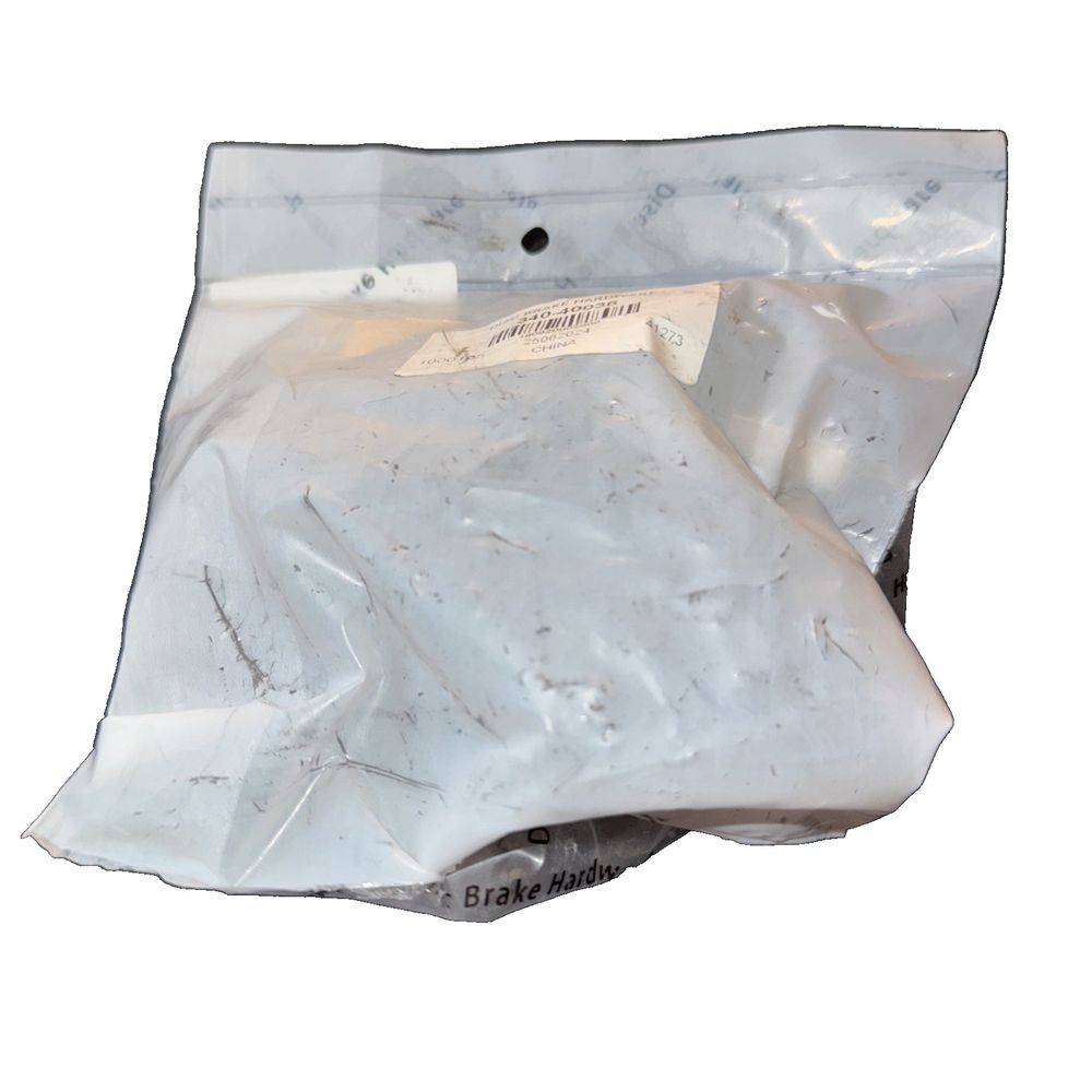 DFC 340-40036 - Front Disc Brake Hardware Kit – a bag of white powder