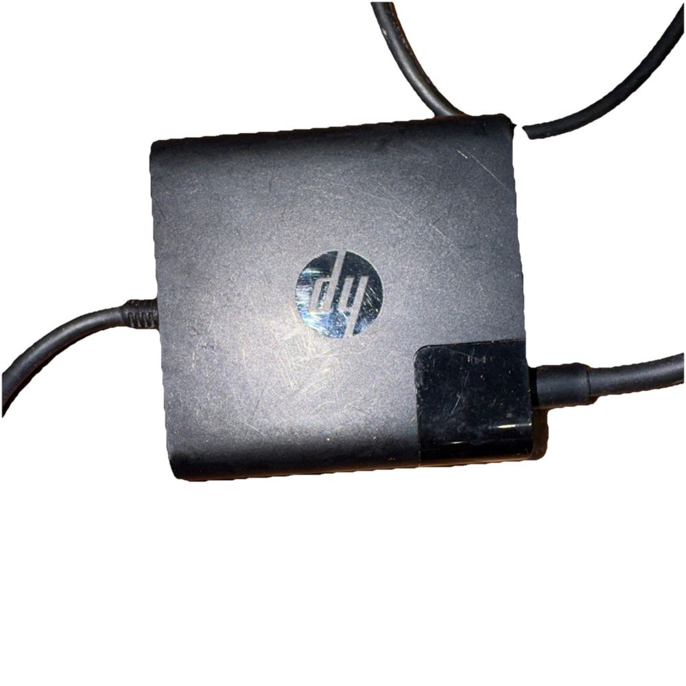 Genuine HP 65W USB C Power Adapter for X360 TPN-AA03 – a black power cord with a white background