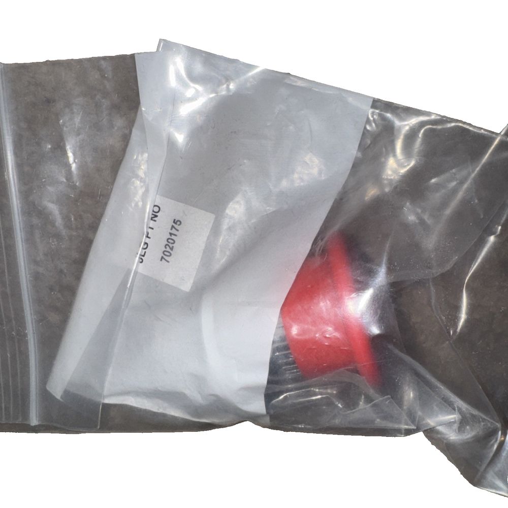 CAP/E-STOP WITH SEALING RING 7020175, UNknown – a red object in a plastic bag