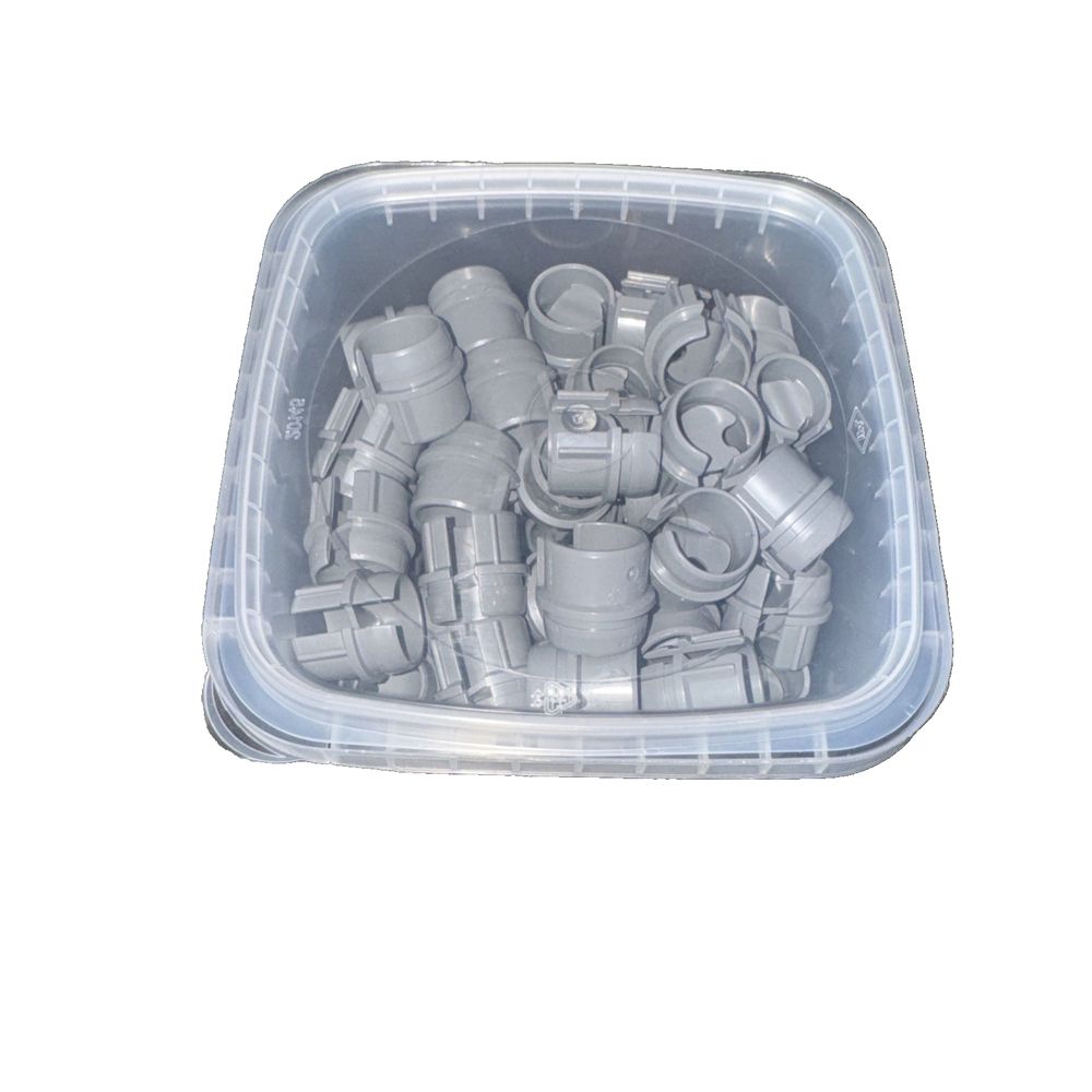 1/2" Plastic Push-In Connector-50/Pack, Hubbell – a plastic container filled with lots of plastic parts