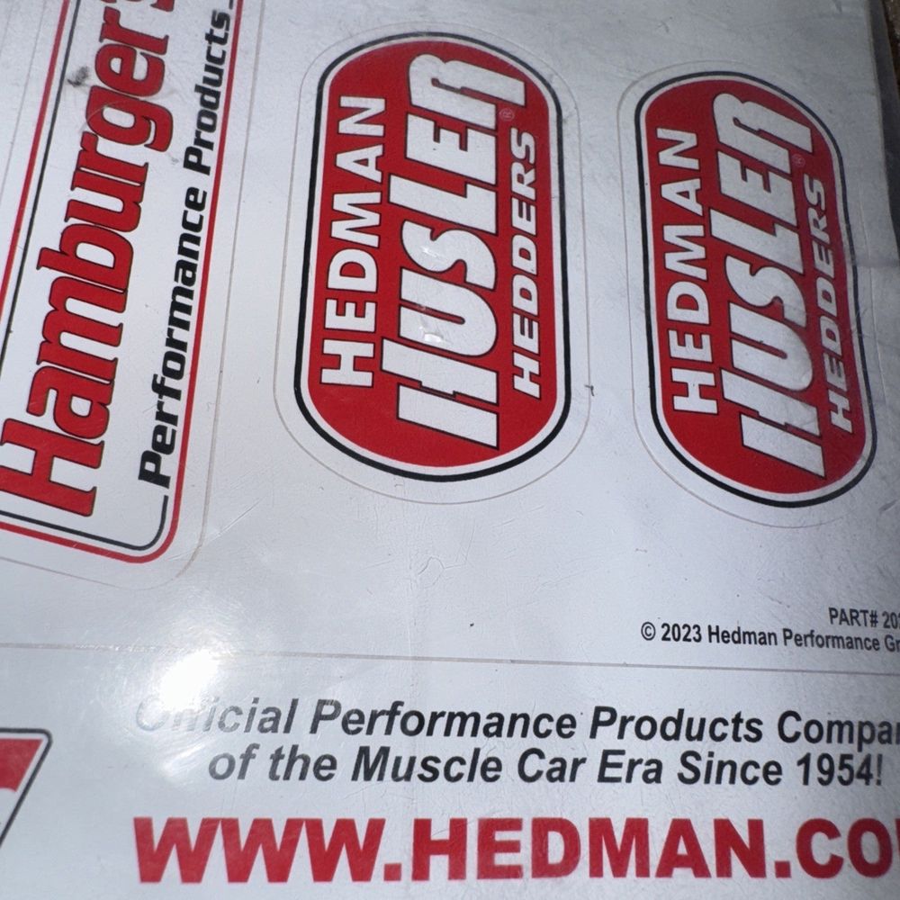 Black Long-Tube Headers for 1977-79 2WD Ford F150-F350 Trucks 1/2, 3/4 & 1 Ton 2, Hedman Hedders – a box of stickers with a logo on it