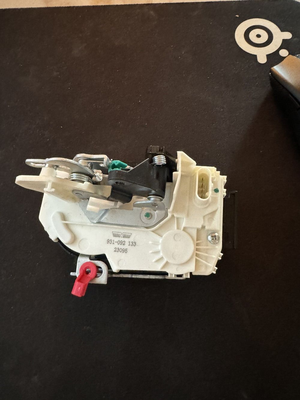 Dorman 931-092 Rear Driver Side Door Lock Actuator Motor Compatible with Select – a close up of a white and black device