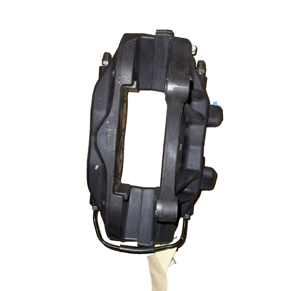 Front Brake Caliper M12 RH For Tesla - Brembo – a black mask with a white background