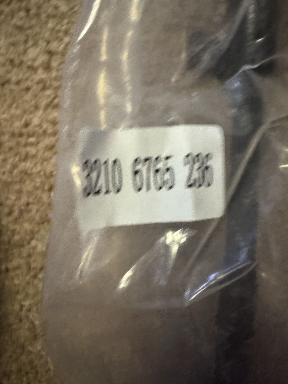 Tie Rod Axle J21 - Durable Steering Component | 3210 6765 236, Unbranded – a bottle of water with a label on it