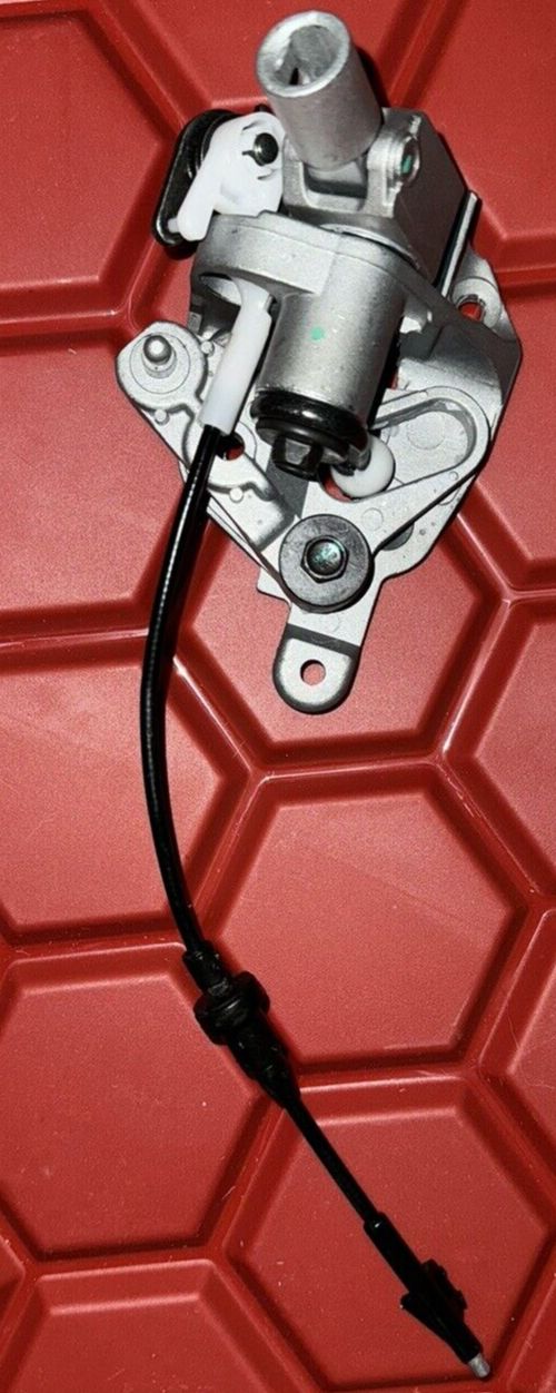 Dorman 905-101 Steering Column Shift Mechanism Compatible with Select Models – a red plastic surface with a metal latch