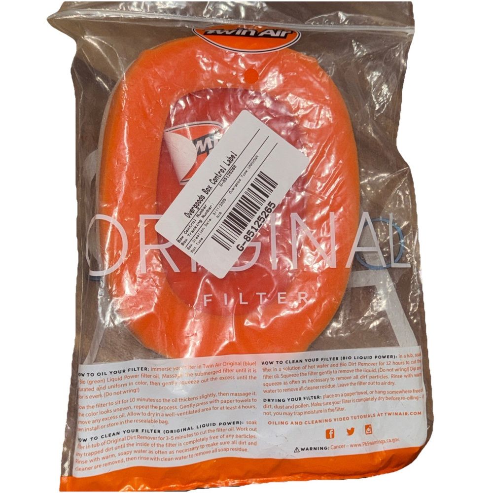 Twin Air Air Filter - 150224 – a bag of orange plastic food wraps