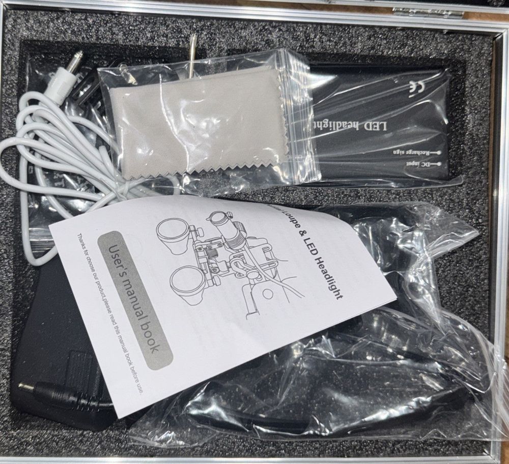 DY-401 3.5 X 420mm Binocular Loupes Magnifier Glasses with LED Head Light+Alumin, Unbranded – a box with a white and black object
