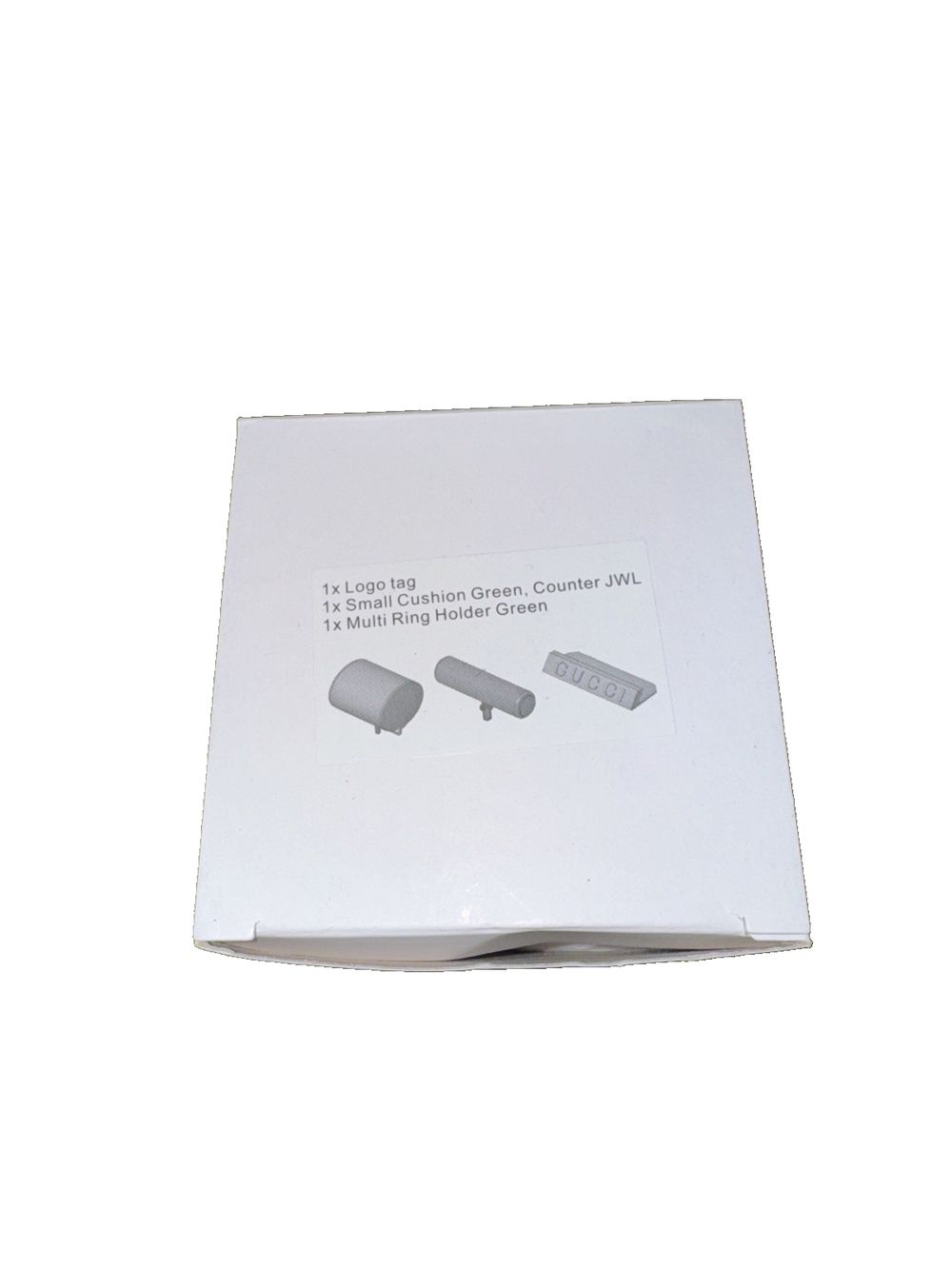 1X Logo Tag 1X Small Cushion Green, Counter JWL, 1x Multi Ring Holder Green, DaveyDooDeals – a white box with a white lid and a black lid