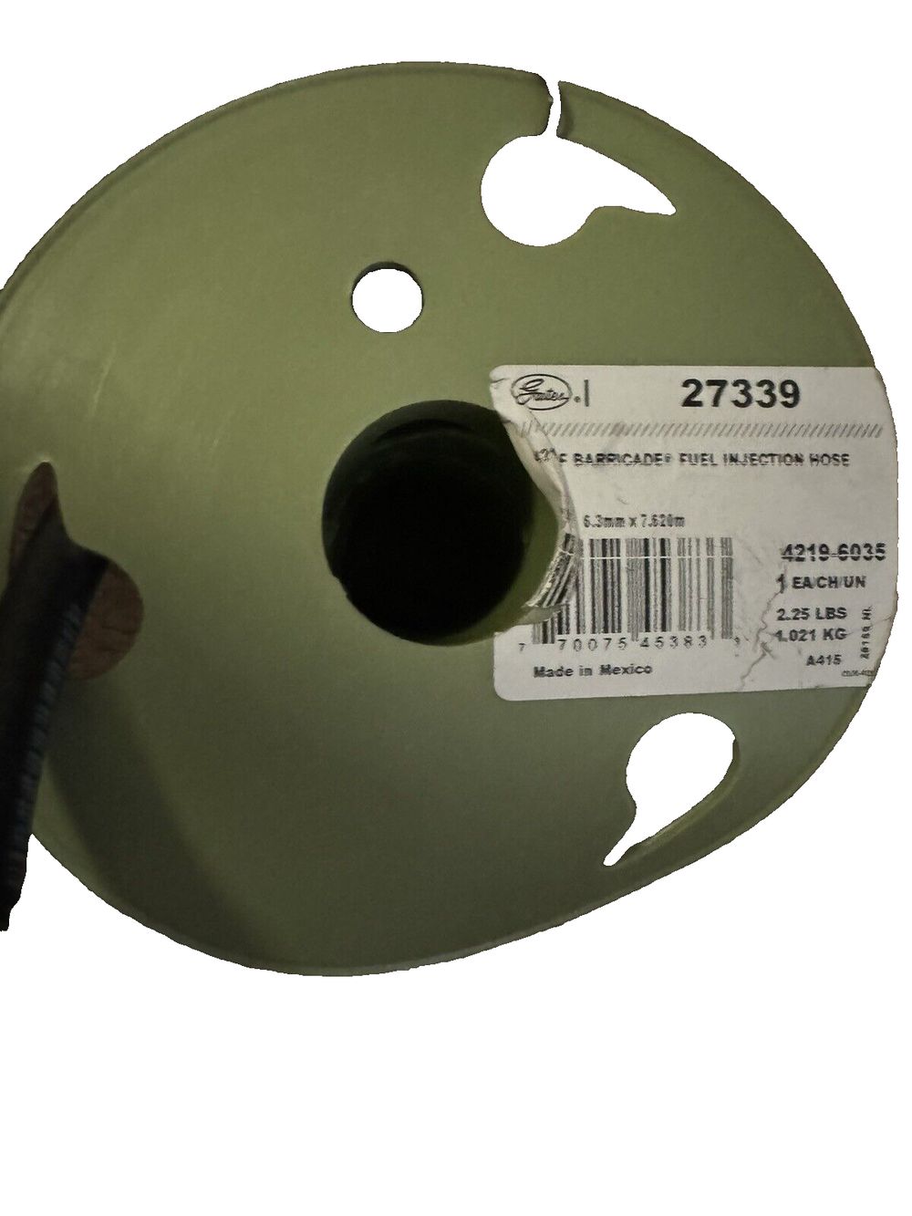 Barricade Fuel Injection Hose, Gates – a green spe with a black handle