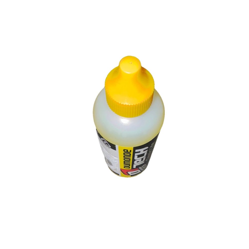 Lube Dumonde Tech Classic LiteChain Lube 4 oz – a bottle of yellow paint on a white background