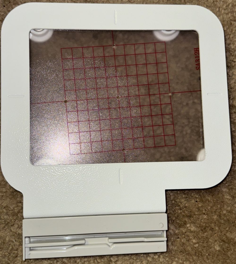 Bequilter SA439 Metal Magnetic Embroidery Hoop 4"x4", DaveyDooDeals – a white box with a red grid on it