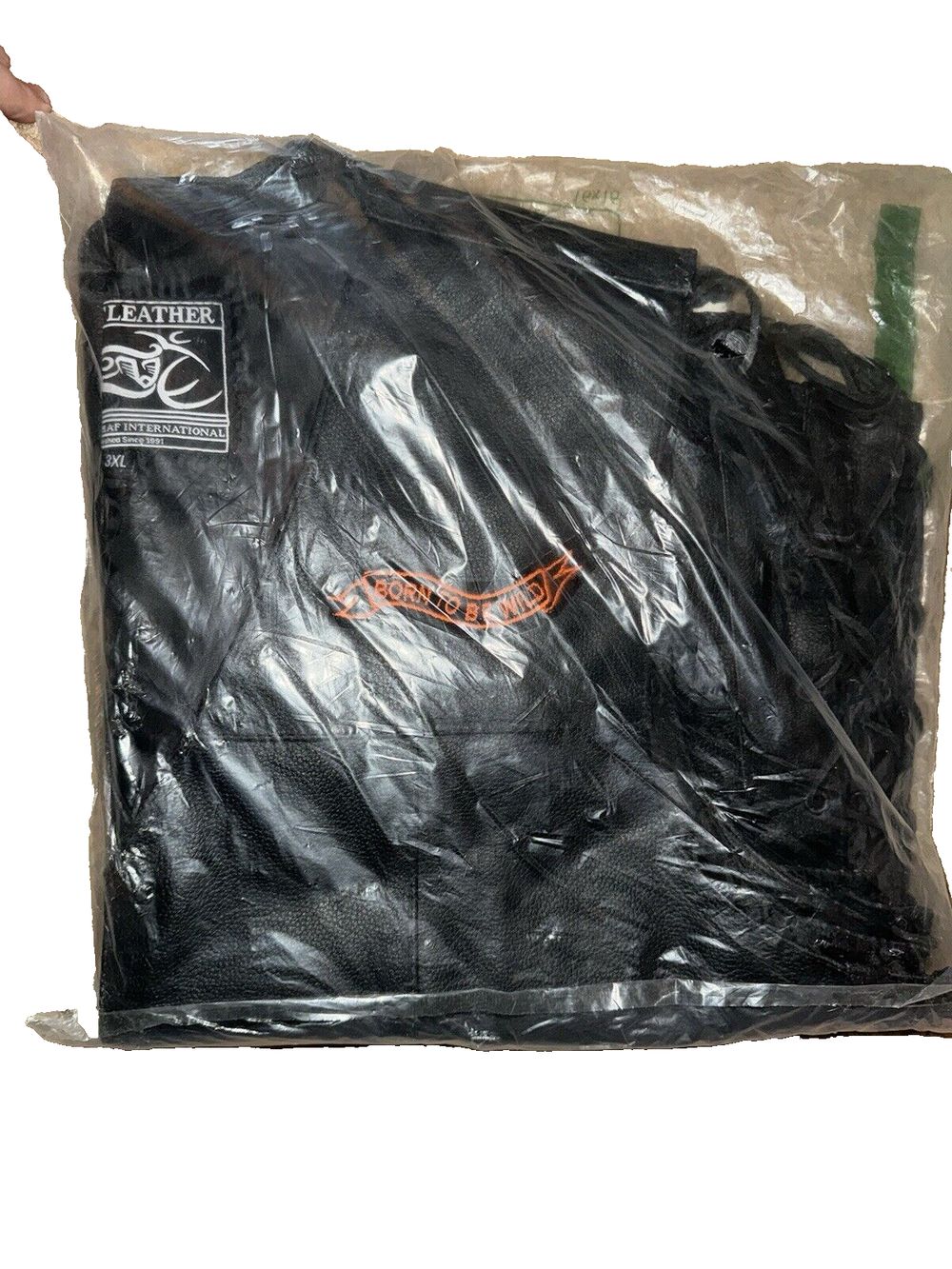 Event Leather ELM3930 Black Motorcycle Leather Vest for Men w-Patches 3X Large – a black plastic bag with a white background