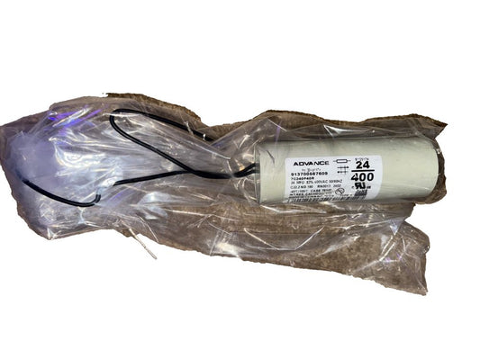 Advance 913700567609, 400VAC, 50/60Hz Capacitor. NOS – a white plastic bag with a black handle