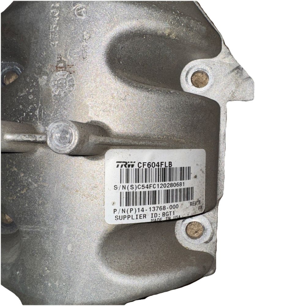 TRW CF604FLB 14-13768-000 Steering Column for Freightliner USED – a close up view of a metal gear