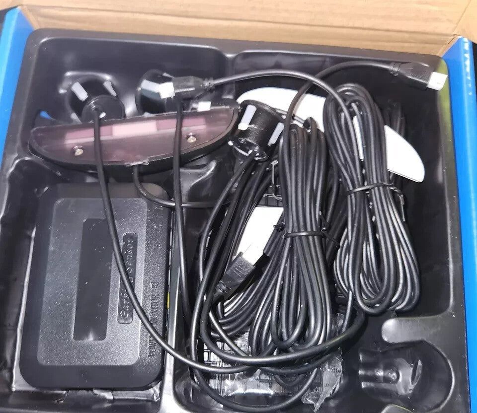 Yamantic Car Reverse Backup Radar System with LED Display & 4 Parking Sensors – a box with a charger and a charger