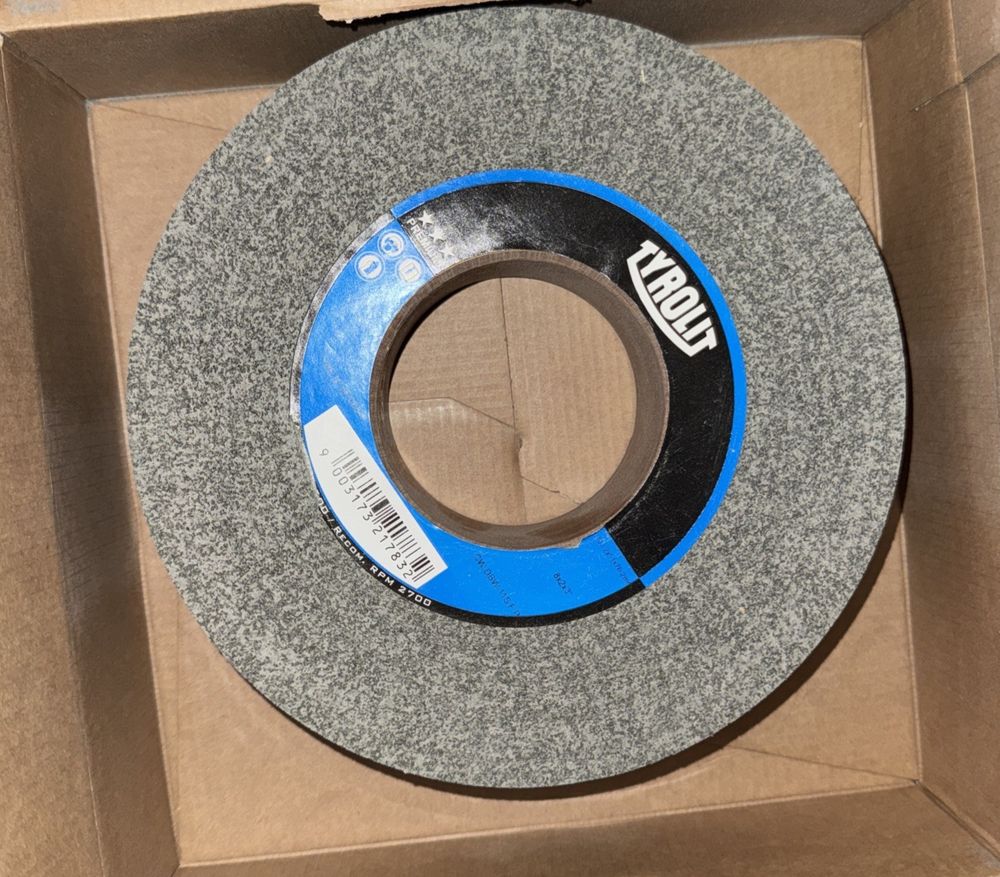 Tyrolit 203,2x51x76,2 MM Convolute Deburring Wheel – a blue and black grinding wheel in a cardboard box
