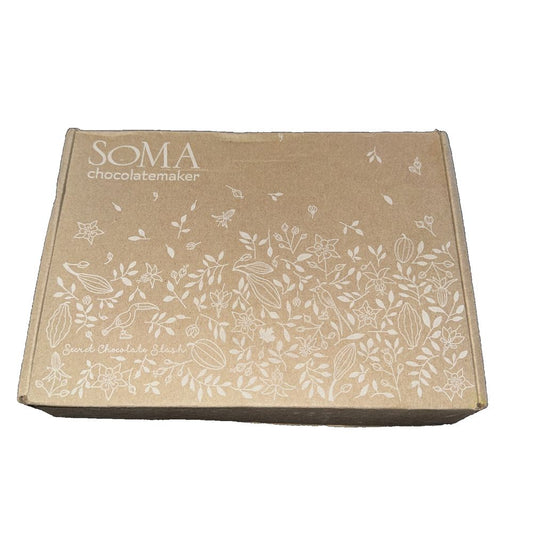 Soma Starry Night Milk Chocolate with Newfoundland Sea Salt Case Of 12 BB 2027 – a cardboard box with a white floral design