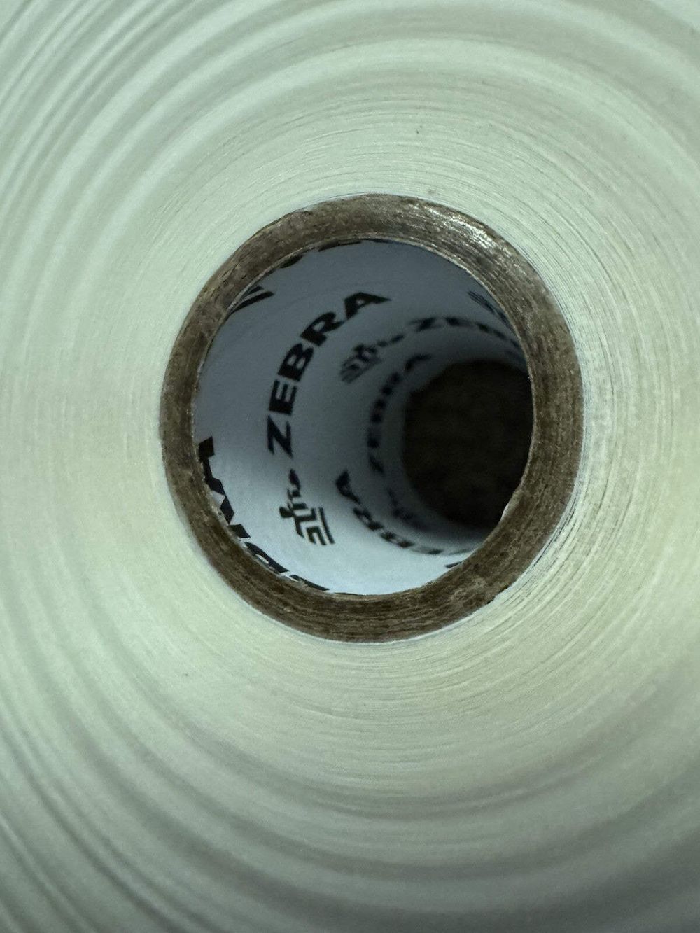 10010051 - Zebra 2.25" x 1.25" Z-Select 4000D Label (Case), DaveyDooDeals – a roll of toilet paper is seen in a hole