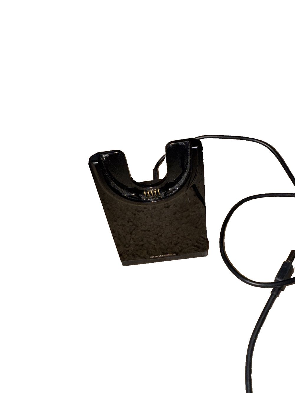Plantronics 203-79-101 Headset Dock – a black and white photo of a small device