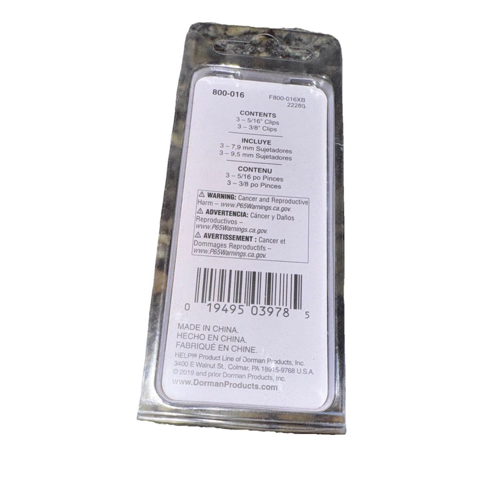 Dorman 800-016 3 Each - 5/16 In. And 3/8 In. Fuel Line Retaining Clip Assortment – a small piece of metal with a barcode on it
