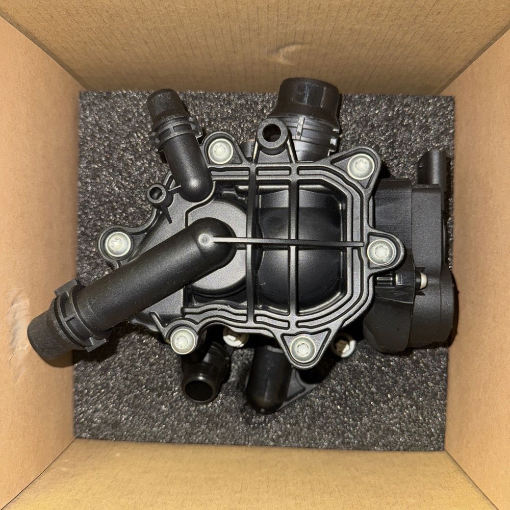 330i Heat management module - 11537644811, Unbranded – a box with a black plastic water pump