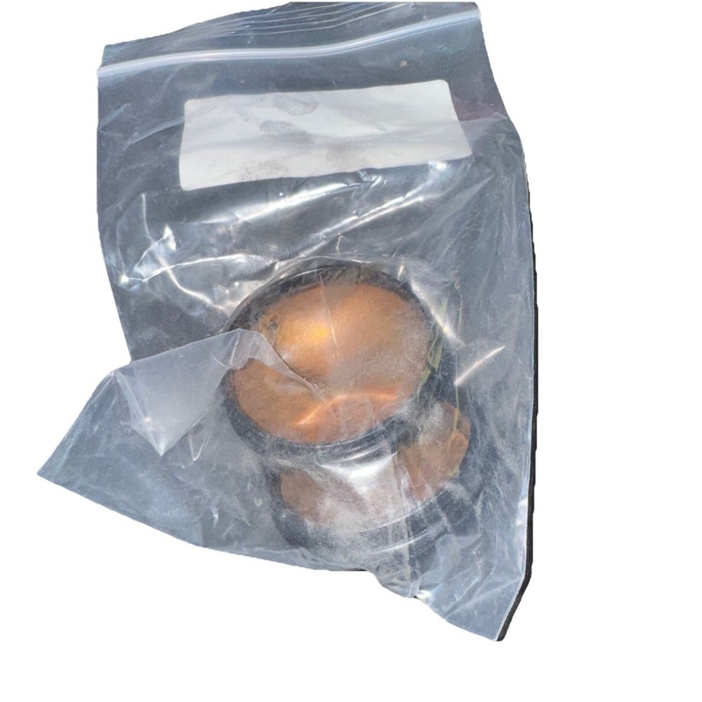 205-1214 Ditch Witch DUST CAP W/ CRE 2 Pack, DaveyDooDeals – a plastic bag with an egg inside