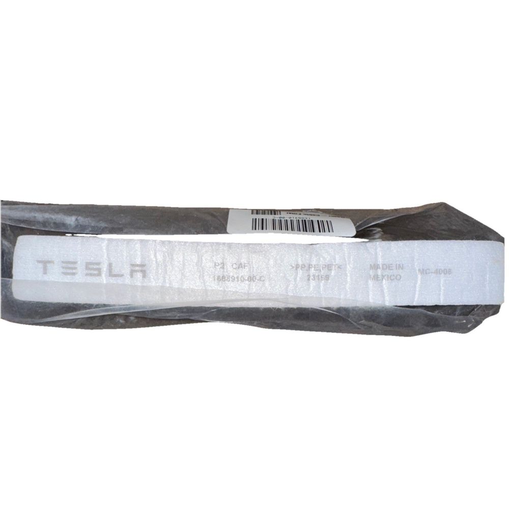 Tesla 1688910-00-C Model S/X Air Filter – a white plastic bag with a black plastic handle