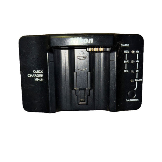 Nikon MH-21 Quick Charger No Power Cable – a black and white photo of a camera