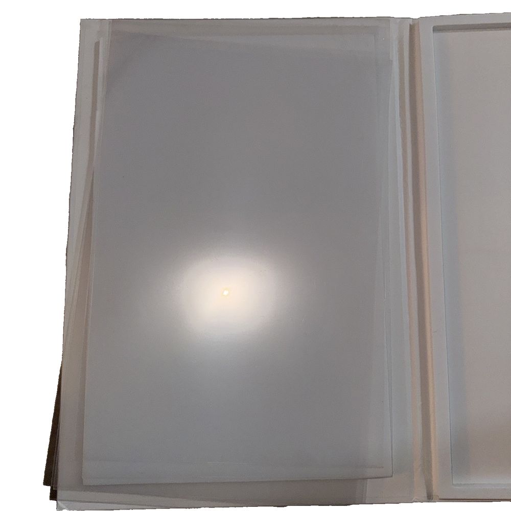 PFA Release Liner Film 5 PCs 273x176MM Elegoo – a white book with a light on top
