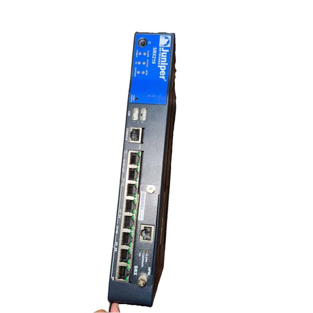 Juniper SRX210 Services Gateway (No Cables) – a hand holding a ethernet ethernet ethernet ethernet ethernet ethernet ethernet ethernet ethe…